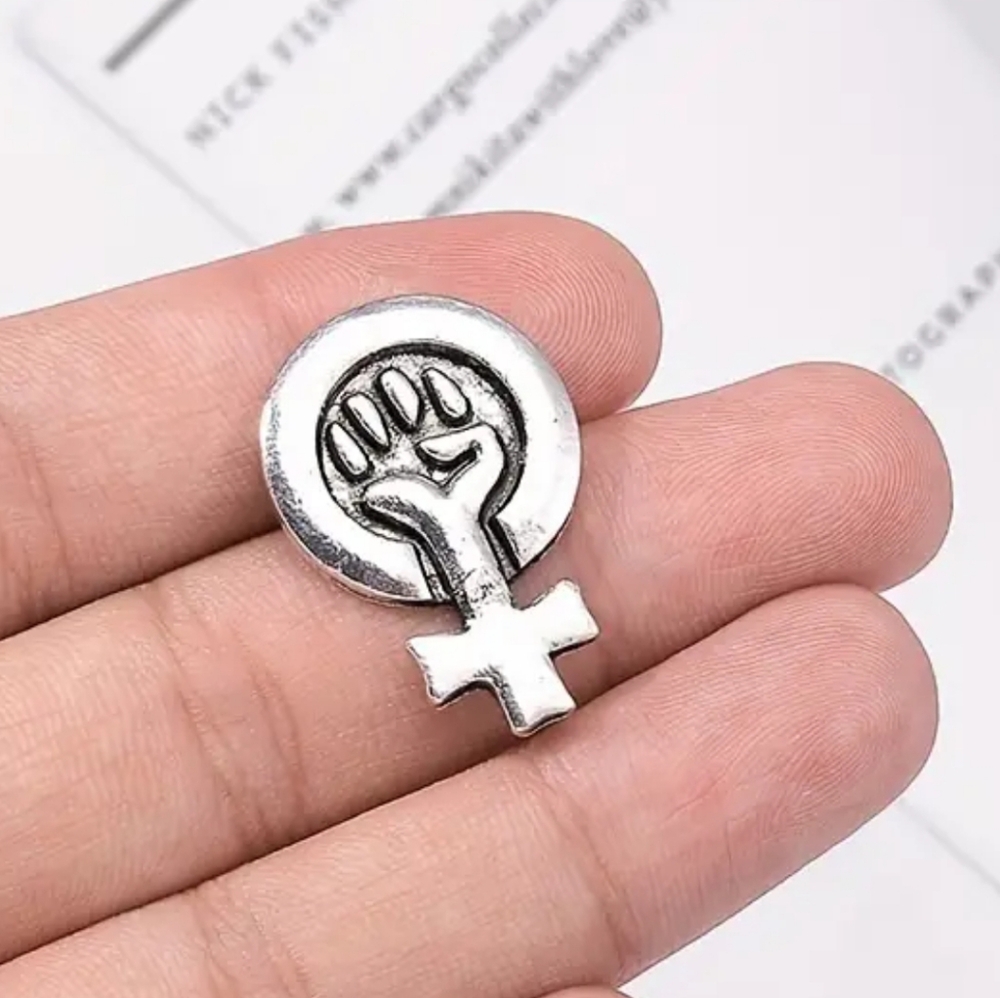Silver-colored enamel pin